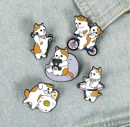 Funny Cats Enamel Pin Custom Cat Egg Bike Dumbbells Sports Brooches Bag Lapel Pin Cartoon Badge Jewelry for Kids Friends